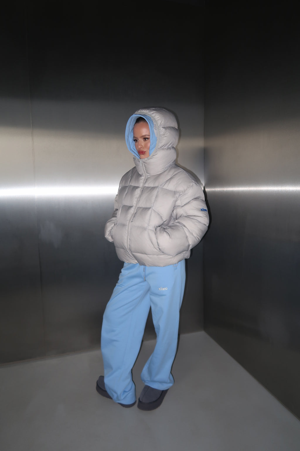 Pilka pūkinė striukė